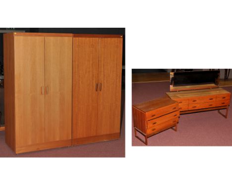 E. Gomme, G-Plan: a teak four-piece 'Quadrille' pattern bedroom suite, c.1960's, comprising: two wardrobes, 92cms (36in.), a 