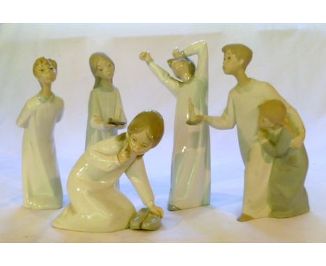 Five Lladro figures of children in nightshirts, the tallest 22cm high