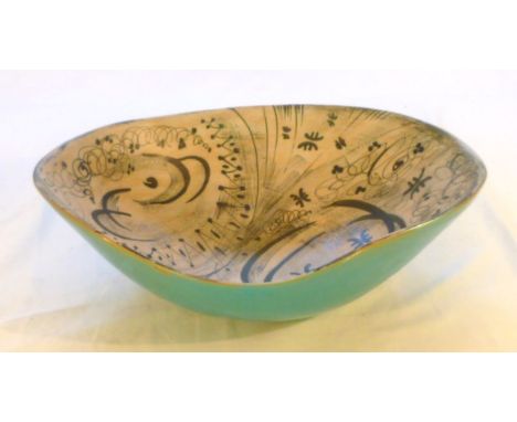 Large studio ceramic fruit bowl, the interior with abstract design, blue glazed exterior, shaped rim, potter's mark to unders