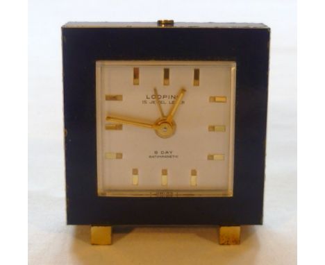 Looping 15 jewel eight day antimagnetic Swiss Made desk alarm clock, blue enamel casing with brass feet