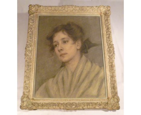 Pastel portrait of a young lady circa 1908, signed bottom right, label verso, glazed and framed, 44x34cm