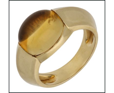 An 18ct gold citrine dress ring by Chaumet, the cabochon-cut citrine tension set to a tapering angled band, the under bezel s