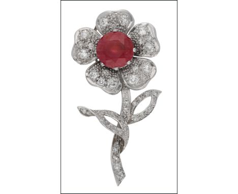 A ruby and diamond. brooch, circa 1950, realistically modelled as a flower set centrally with a circular-cut treated ruby, th