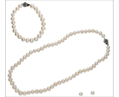 A freshwater cultured pearl necklace and bracelet suite, comprising a single strand necklace and bracelet each with a rose fl