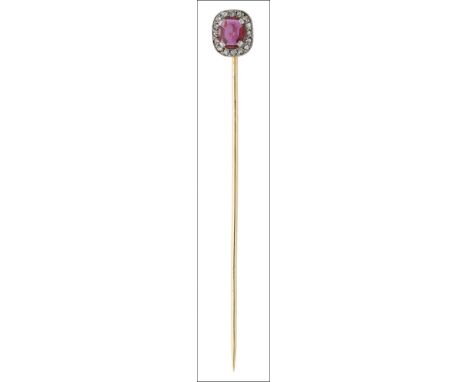 An Art Deco ruby and diamond stickpin, circa 1920, the cushion-shaped ruby within a surround of rose-cut diamonds, mounted in