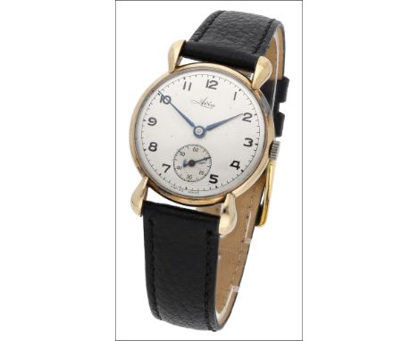 Avia. A gold wristwatch with tear-drop lugs, circa 1949 Movement: manual winding, 15 jewels Dial: silvered, Arabic numerals, 