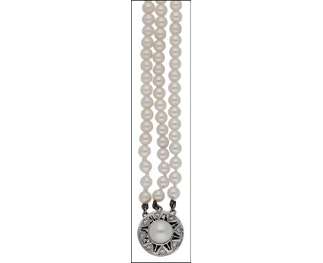 A cultured pearl choker, the three-rows of cultured pearls measuring approximately 4.3mm, to a pierced clasp with a central c