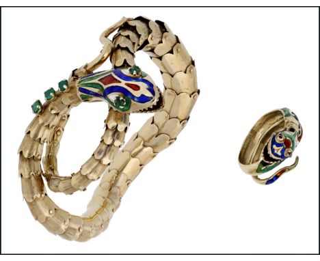 A serpent bracelet and ring, the bracelet of textured articulated scales, the head with polychrome enamel decoration, emerald