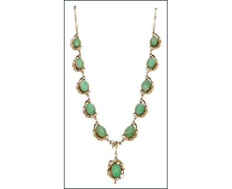 A jadeite necklace, the foliate links leading to an ornate frontispiece set with jadeite cabochons within scrolled settings w