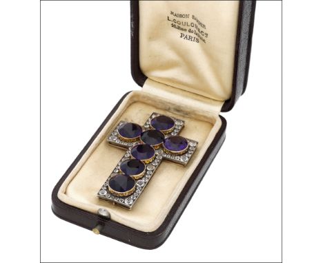 A 19th century amethyst cross pendant, the seven circular-cut amethysts within a surround of old-cut pastes, mounted in silve