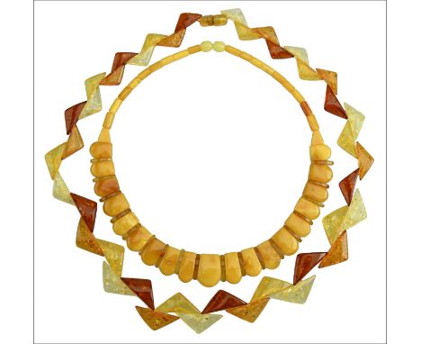 Two treated amber necklaces, the first composed of triangular amber beads with varying depths of colour, together with a seco