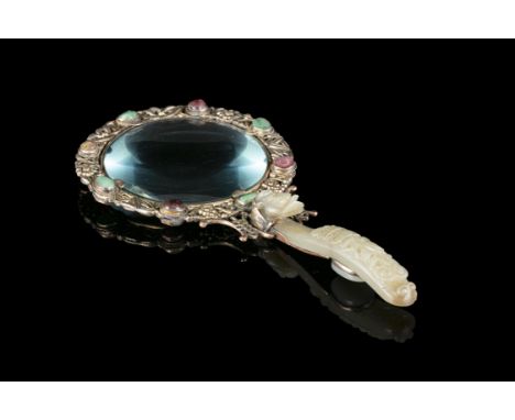 A JADE AND SILVER PLATED MOUNTED ‘THREE THRIENDS OF WINTER’ MAGNIFYING GLASS China, The jade dating to the Qing DynastyThe mo