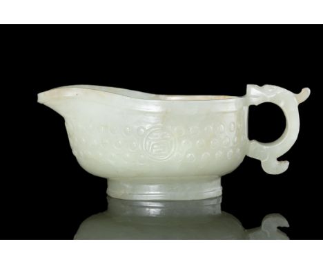 A CELADON AND RUSSET ‘RICE-GRAIN’ PATTERN LIBATION CUP, YIChina, Ming Dynasty, 16th-17th centuryThe bulbous body is raised on