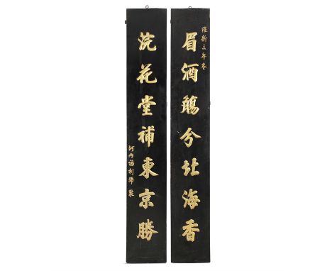 A PAIR OF GILT AND BLACK LACQUERED ‘IMPERIAL SENTENCES’ WOODEN PANELS OF EMPEROR DUY TAN &nbsp;Vietnam, Nguyen Dynasty, Dated