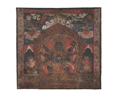 A THANGKA OF A EIGHT ARMED MAHAKALATibet, Presumably 17th centuryThe deity striding in alidhasana on two prostrated figures o