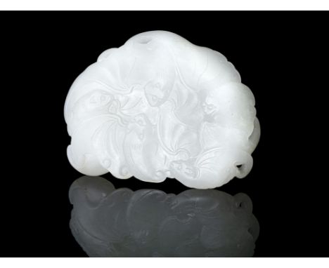 A JADE ‘FIVE BATS’ ELEMENT OF A BELT BUCKLE / HOOK China, Qing Dynasty, 19th century Carved out of a white stone, the obverse