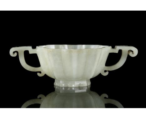 A MUGHAL STYLE WHITE JADE ‘CHRYSANTHEMUM’ TWO-HANDLED CUPChina, Ming Dynasty, 16th-17th centuryThe cup of chrysanthemum flowe