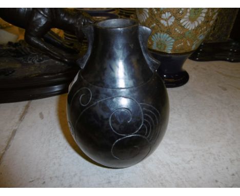 A VINTAGE POTTERY VASE