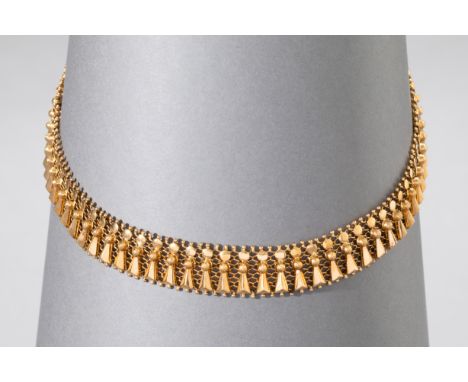 Gold Halskette 18KHalskette. Gold 18 K. L. 45 cm, B. 1,7 cm. Gewicht 57 g. Auf dem Verschluss bezeichnet: 750, italienische M