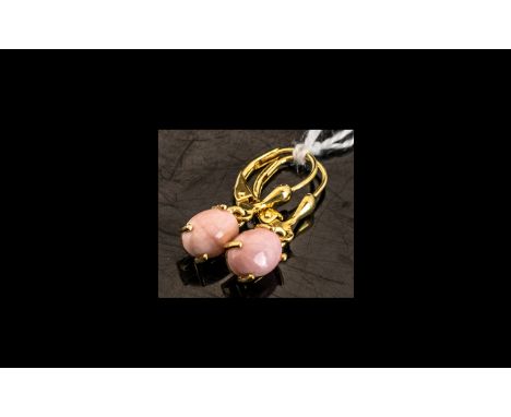 Pink Opal Drop Earrings, an oval cut cabochon of pink opal measuring 1ct to each drop, a total of 2cts of the natural opaque 