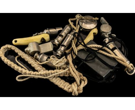 Large Collection of Whistles, a great collection including two early bone whistles, scout's compass etc., eleven items in tot