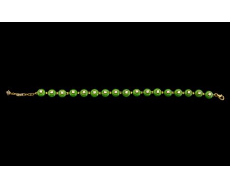 Green Jade and White Zircon Bracelet, roundels of jade totalling 35cts, each claw set with a natural zircon, nestled in the d