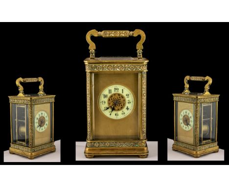 French 19th Century - Superior Large Brass Carriage Clock with Cast Ornate Borders, Visible Lever Escapement, Striking on a G