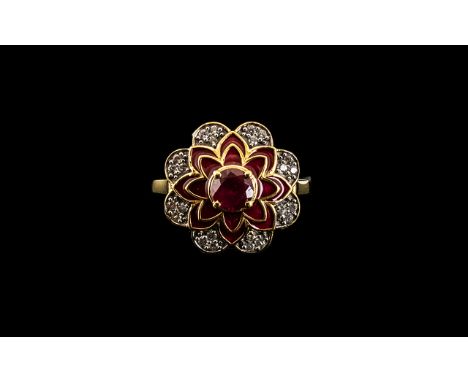 Ruby Centred Flower Ring, a stylised flower of eight petals with a 1.5ct ruby to the centre surrounded by red enamelling, wit