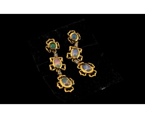 Opal Triple Drop Earrings, three graduated, natural opals to each earring, each colourful opal individually set within an ope
