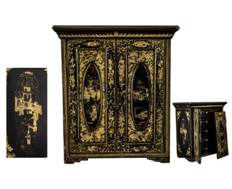 Chinese Export Black Lacquered Table Cabinet, fitted with five drawers to the interior, raised on stylised bracket feet.  Cir