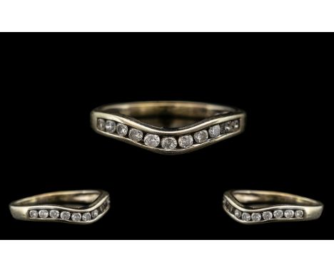 9ct White Gold Contemporary Wishbone Design Diamond Set Ring.  Fully hallmarked for 9ct.  Cal. diamond weight 0.25 pts.  Weig