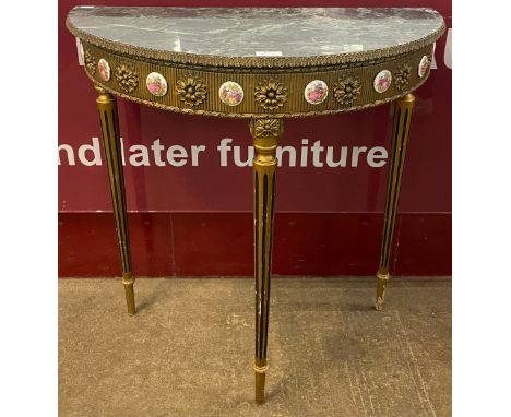 An Italian style gilt and faux marble demi lune console table 