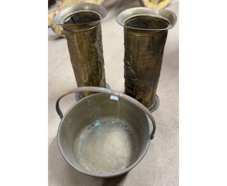 A brass jam pan and two stick stands 