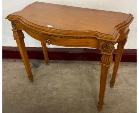 A 19th French style hardwood serpentine single drawer console table 