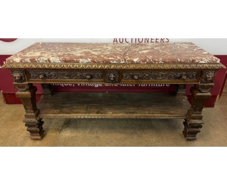 A substantial Victorian Jacobean Revival carved oak and marble topped two drawer console table, made by Christopher Pratt, Br