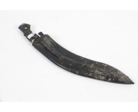 An Indian Gurkha Kukri knife. The single edged steel blade with punch marked decoration to one side, with decorated horn grip