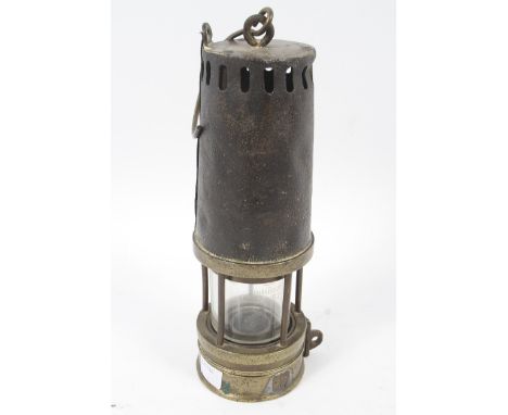 An early 20th century brass mounted miner's lamp. Richard Johnson, Clapham &amp; Morris (Manchester &amp; Liverpool), of tape