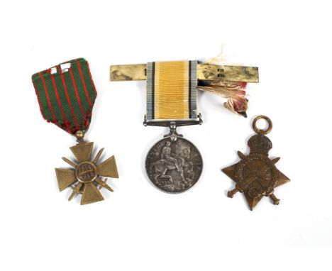 Three WWI medals. Comprising Croix de Guerre 1914-18, 1914-15 star and war medal Condition Report: The War Medal named for PT