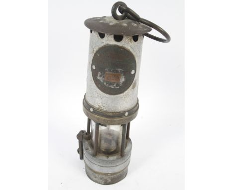An Ackroyd &amp; Best Ltd (Leeds) Hailwood Improved miner's lamp Type 01. Of tapering form, the lower part brass mounted, the