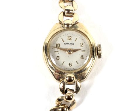 A 9ct gold Rotary ladies wrist watch and strap. Hallmark for Birmingham, The face with numbers and odd number batons, 12.6 gr