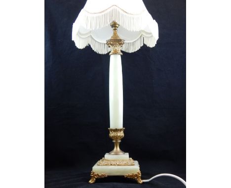 An onyx columnal table lamp, with gilt metal Corinthian mounts. H. 67cm