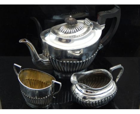 A George V silver plated three piece tea service, stop fluted, (3).