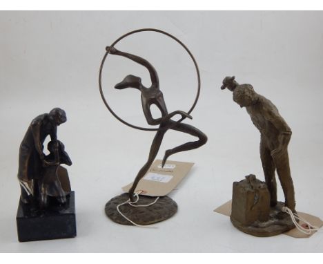 A bronze figure of a man consoling a kneeling woman, signed Barbery, together with a bronze of a gymnast, and one of a workme