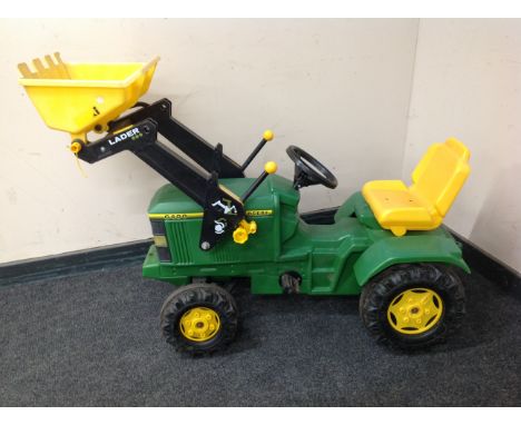A child's John Deere 6400 ride on tractor 