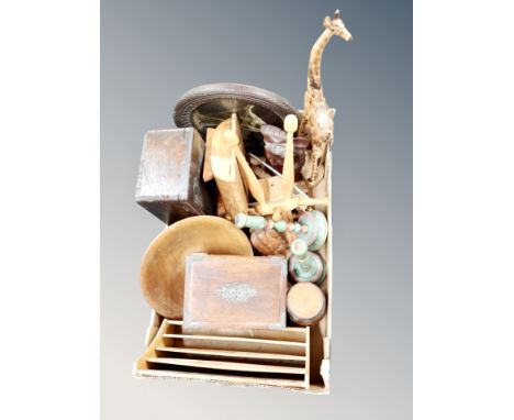 A box containing assorted treen, including carvings, candlesticks, trinket box. 