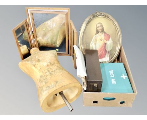 A box containing first aid tin, religious print in gilt frame, folding mirror, metal index chest, further pictures together w