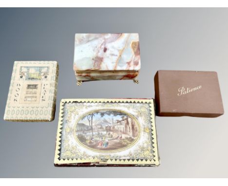 An onyx trinket box, cased Patience game, further case of book plates and a Merlin's Casket card game in decorative box. 