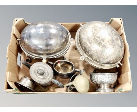 A box of silver plated wares including pair of breakfast warmers with roll top lids, tea service, pedestal bowl, ladle etc. 