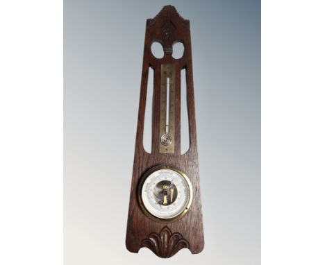 A Danish oak barometer / thermometer. 