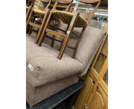 A brown sofa bed